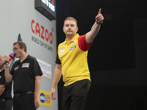 Dimitri Van den Bergh in action at the World Cup of Darts